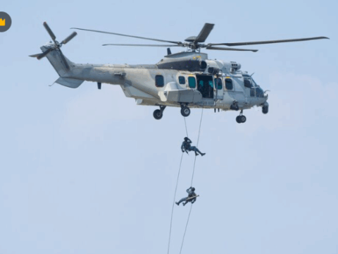 Helicopter Search and Rescue Aircraft Perform High-Risk